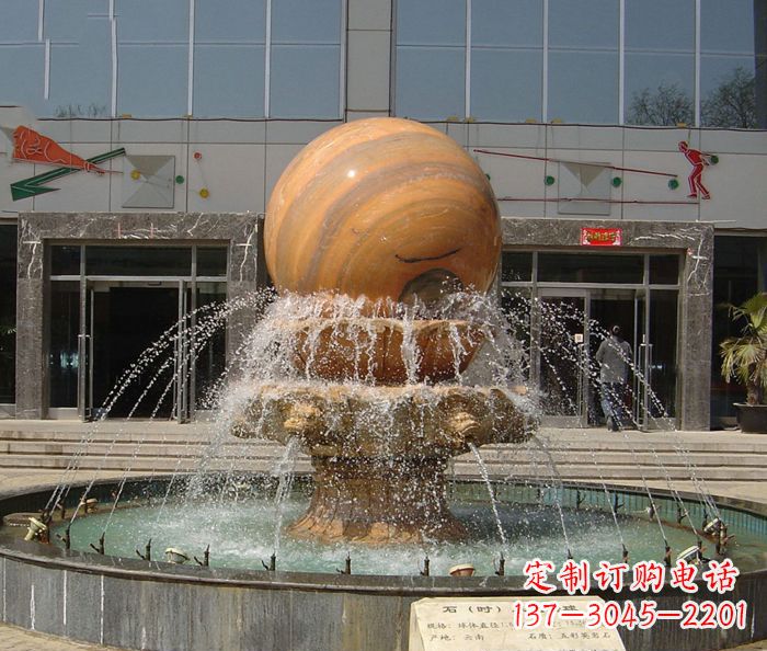廊坊石来运转球晚霞红风水球石雕