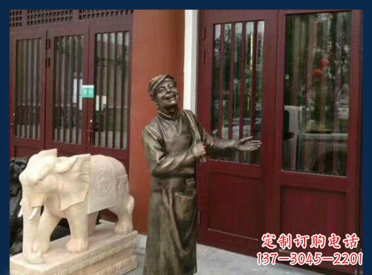 廊坊铜雕店小二酒店迎宾人物雕塑