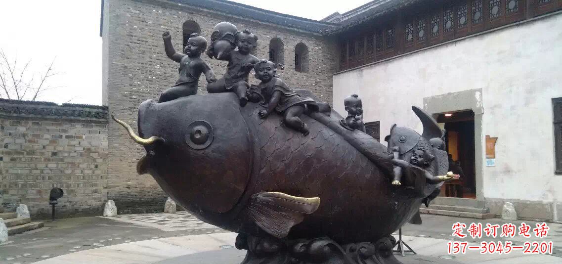 廊坊小孩骑鱼铜雕