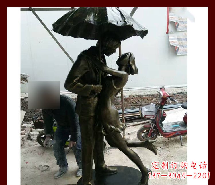 廊坊雨伞下拥抱的情侣铜雕
