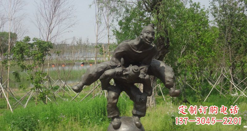廊坊园林站在球上面跳山羊的人物景观铜雕