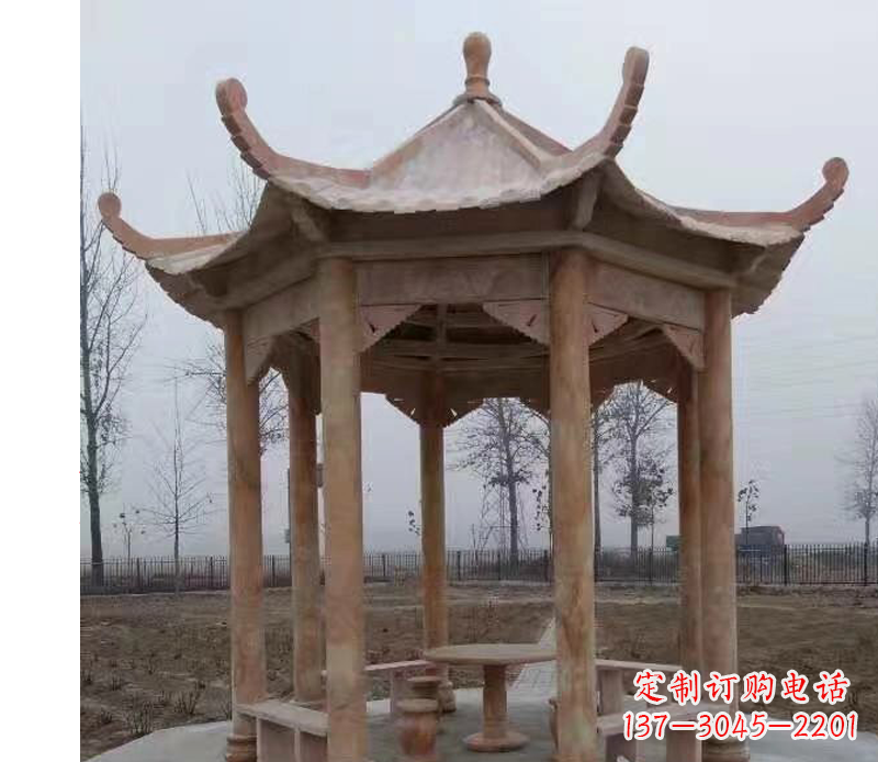 廊坊公园晚霞红八角石雕凉亭