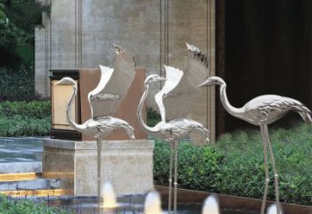 廊坊鹤雕塑-公园不锈钢镜面喷泉中的鹤雕塑